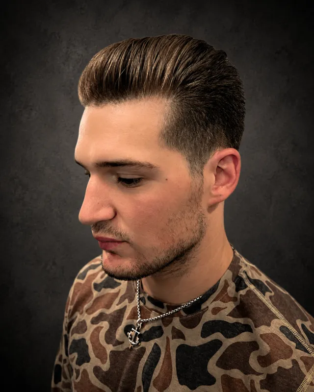 Client with a classic pompadour haircut by Tami Lee