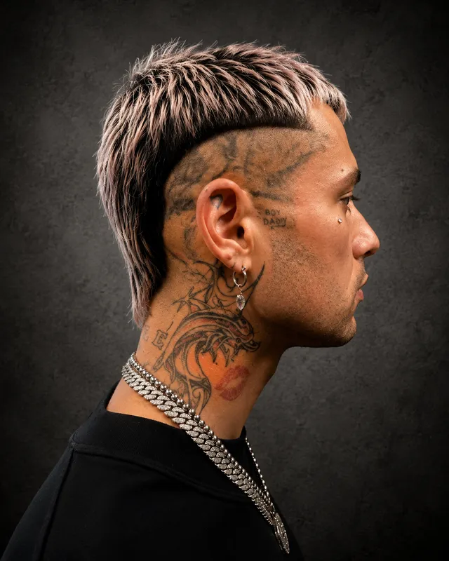 Client with a creative mullet haircut by Tami Lee
