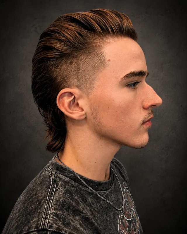 Client with a long slickback haircut by Tami Lee
