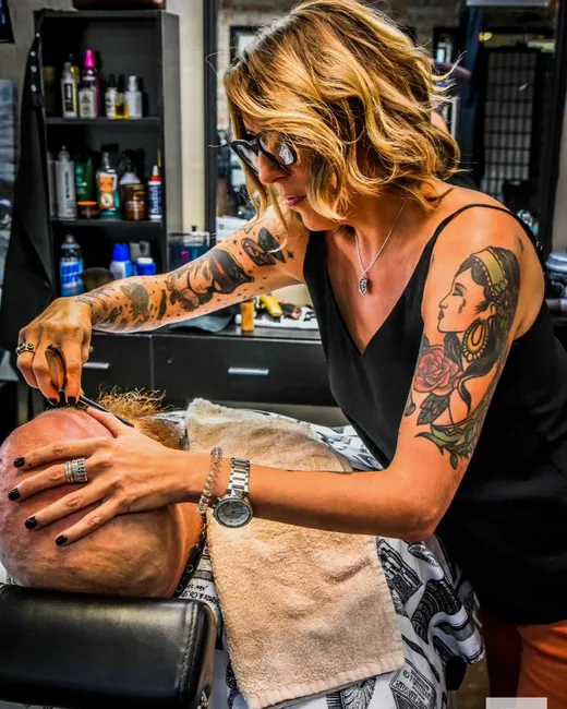 Tami Lee giving a close straight razor service